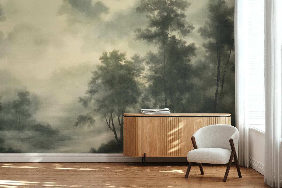 Room with a wooden buffet table, a white lounge chair, and a wallpaper featuring a vintage forest in green, with a texture of a painting. 