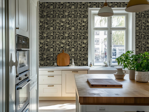 Modern scandinavian kitchen with a kitchen island with basil plants, and a tropical art deco wallpaper. 