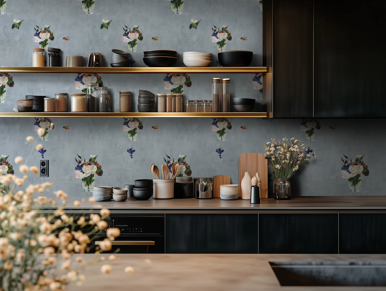 Modern kitchen with floral wallpaper and wooden shelves.
