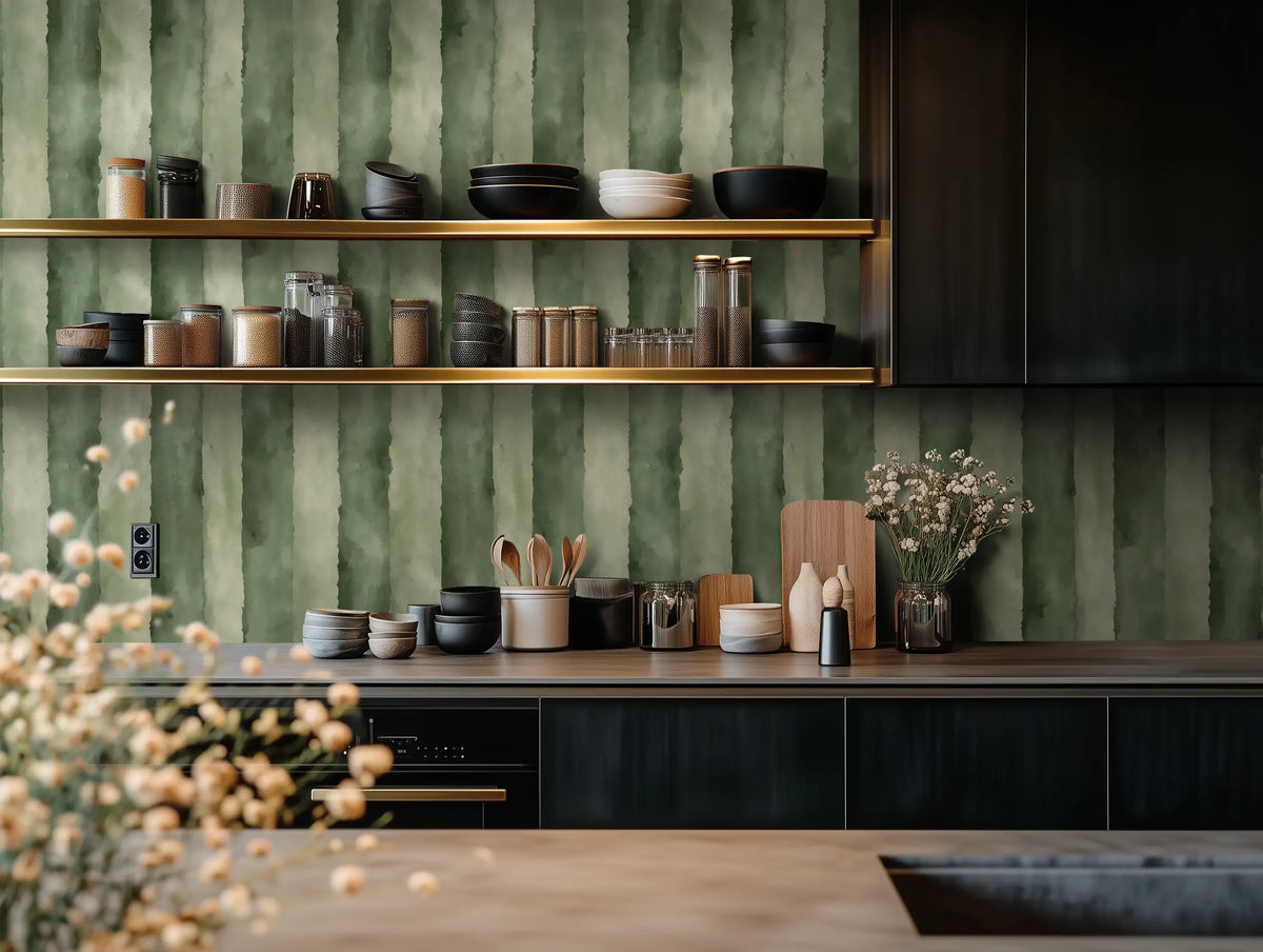 Modern kitchen with painted wallpaper with green stripes. 