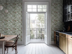 Modern kitchen with floral wallpaper trellis. 