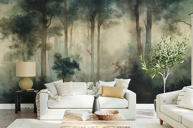 Living room with a forest mural wallpaper, white sofa, and decorative items.