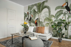 Tropical mural wallpaper in living room, jungle design with parrots, toucans, and palm trees