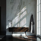 A hallway with a brown sideboard and marble wallpaper wallcovering