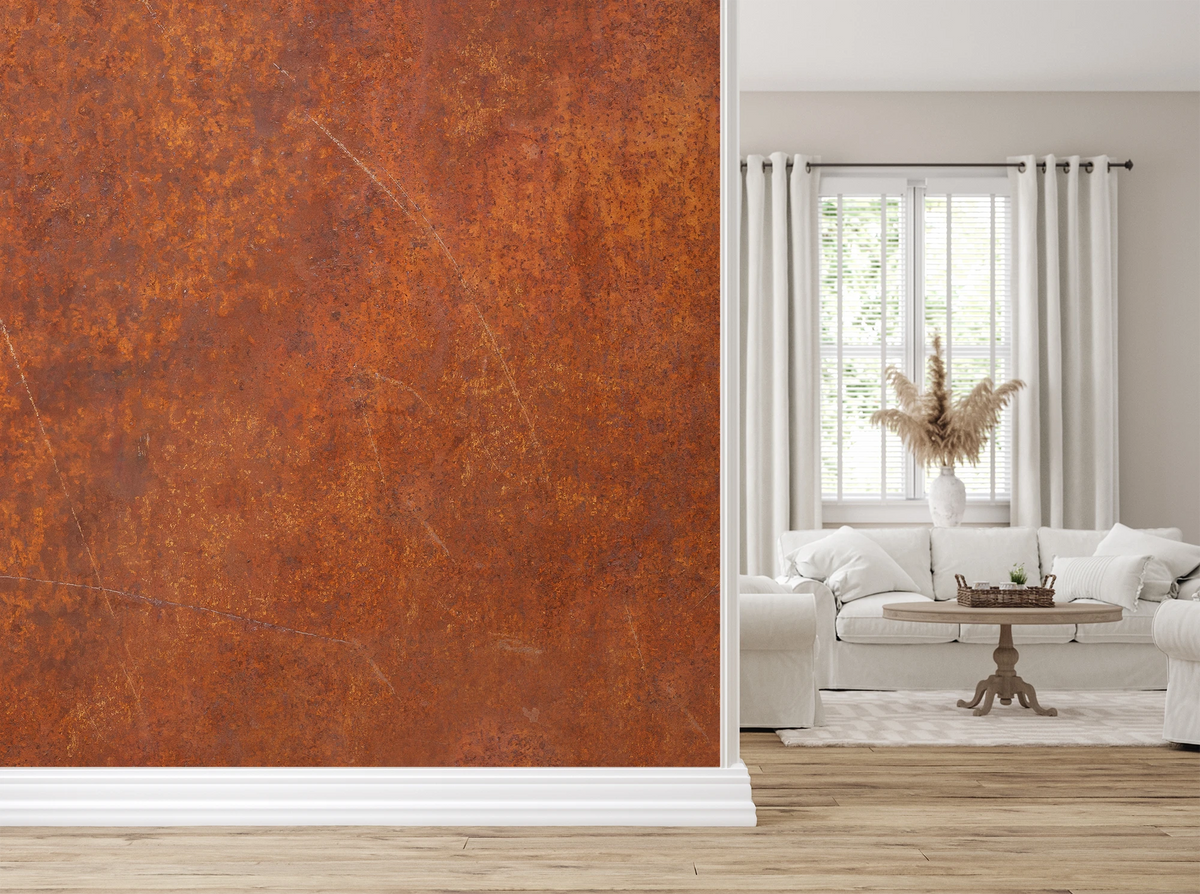 Modern living room with a white sofa, and a wallpaper mural with industrial rust texture. 