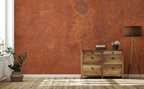 Modern living room with a wooden cabinet, and a wallpaper mural with industrial rust texture. 