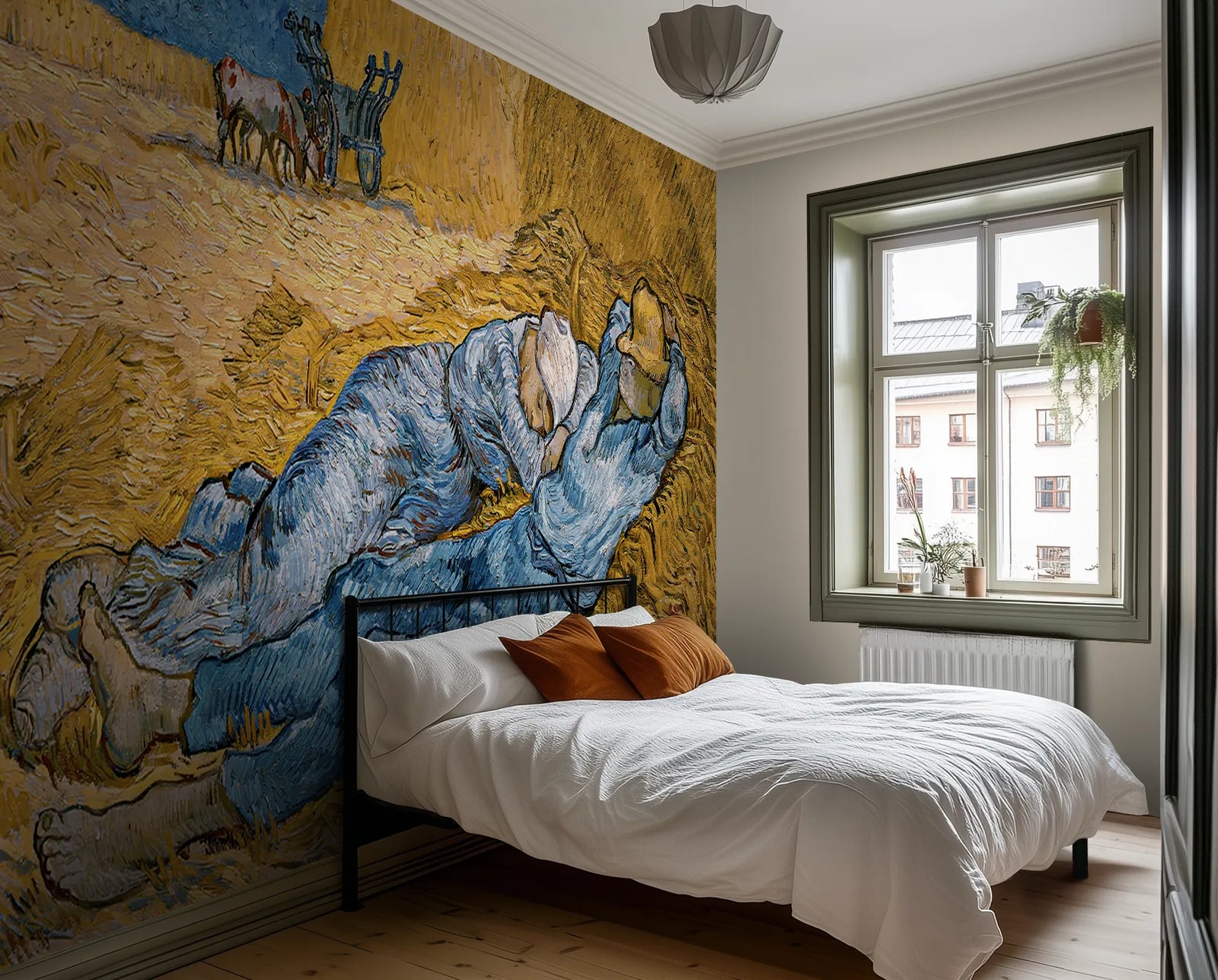 Modern bedroom wth a bed, white sheets, and a large wallpaper mural of Van Gogh's "The Siesta"