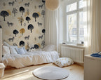 Children's bedroom with patterned zebra forest wallpaper, bed, and round rug.
