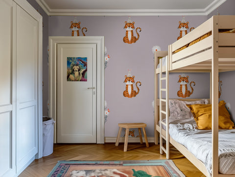 Children's room with a bunk bed, and tiger-themed wallpaper.