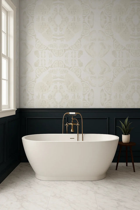 Modern bathroom with a freestanding bathtub, gold faucet, and beige butterfly wallpaper pattern.