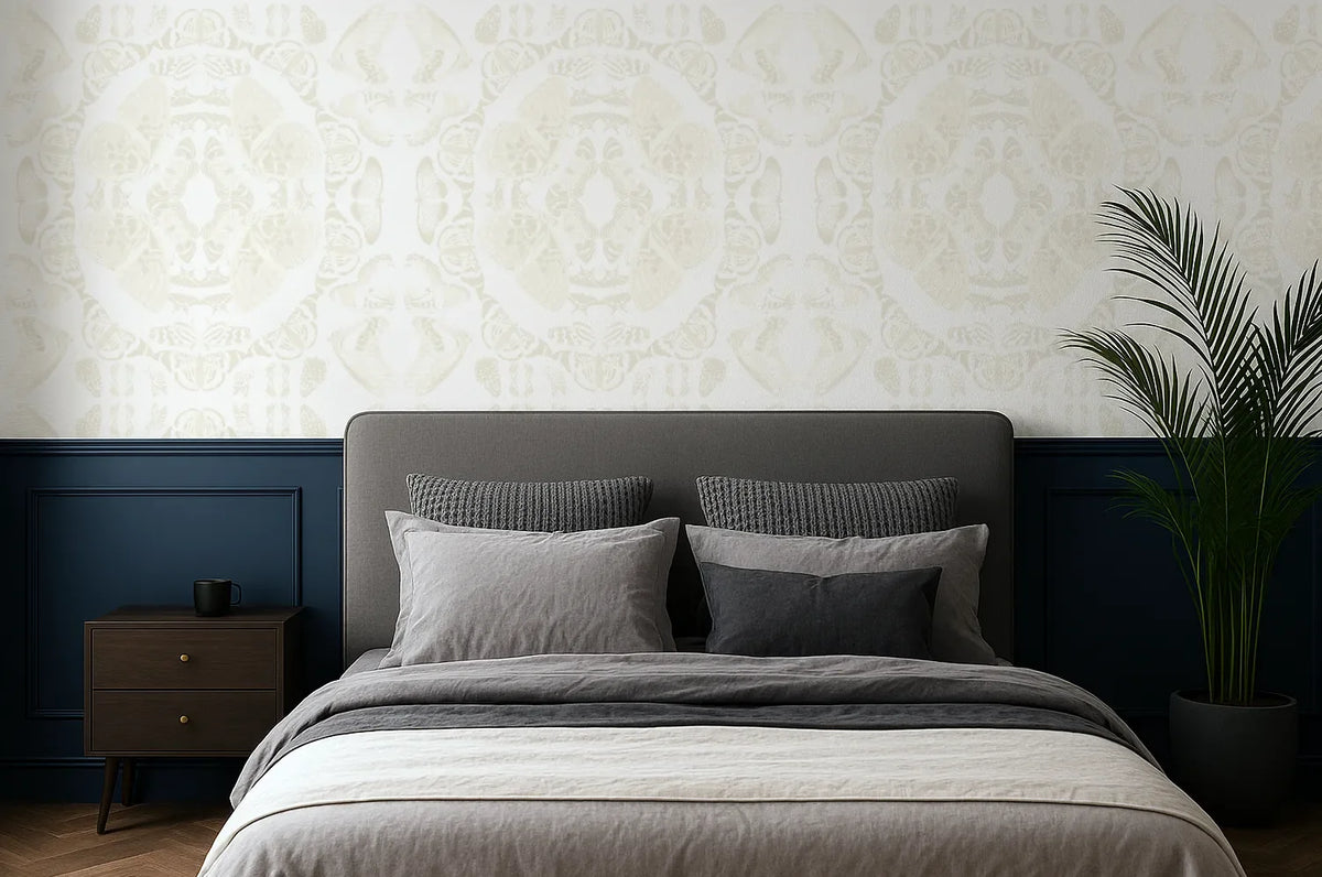 Bedroom with a bed, nightstand, and beige butterfly wallpaper pattern.