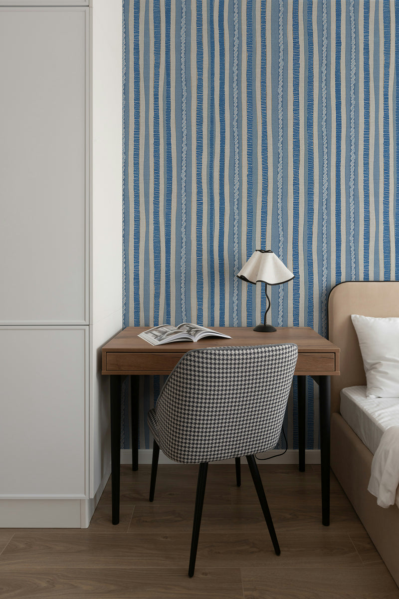 Blue striped wallpaper in  bedroom, modern stripe wall design with clean Scandinavian style