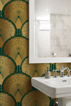 Bathroom with decorative green and gold art deco wallpaper, sink, and mirror.