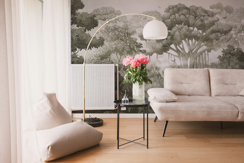 Forest mural wallpaper in living room, lush green trees wall mural, nature-inspired interior design