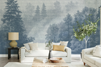 Blue forest wallpaper mural in a cozy Scandinavian living room with soft neutral furniture, textured decor, and misty Nordic trees inspired by fjord landscapes.