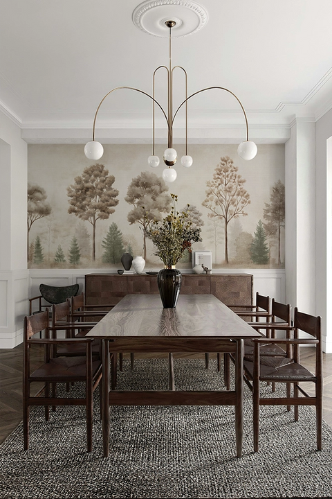Modern dining room with a chandelier and a vintage forest mural wallpaper