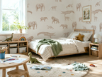 Children's bedroom with dinosaur-themed decor, including wallpaper and toys.