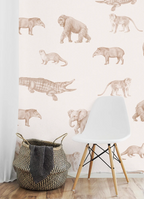 White chair and woven basket against a wall with kids animal wallpaper