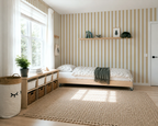 Modern kids bedroom with striped wallpaper, a bed, and wooden furniture.