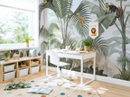 Children's room with jungle-themed wallpaper, desk, and toys.