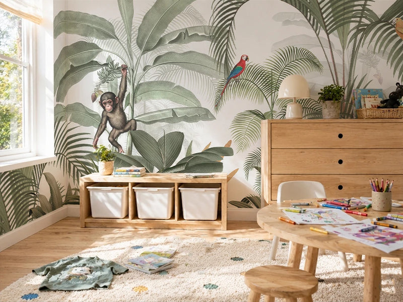 Children's room with jungle-themed wallpaper, wooden furniture, and toys.