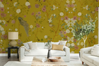 Living room with floral chinoiserie wallpaper, white sofa, and decorative elements.