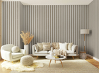 Living room with textured grey striped wallpaper, white sofa, armchair, and coffee table.