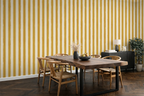 Modern Kitchen with a live edge wood slab table, and a hand painted wallpaper with stripes of cream and yellow. 