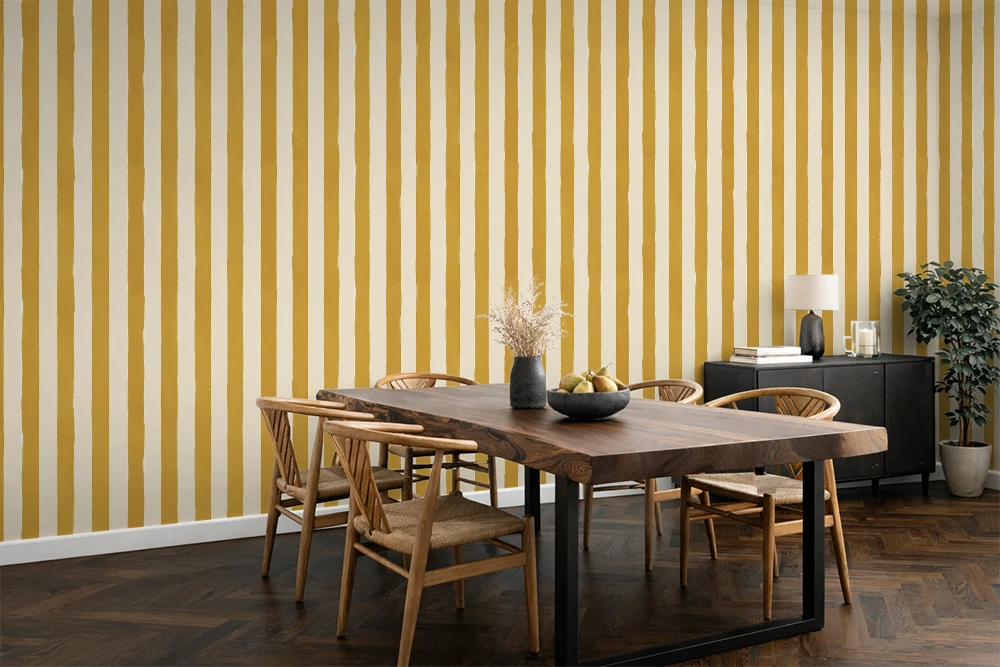 Modern Kitchen with a live edge wood slab table, and a hand painted wallpaper with stripes of cream and yellow. 