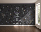 Room with floral chinoiserie wallpaper on a dark wall and a window letting in natural light.