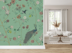 Floral chinoiserie wallpaper, next to a living room with white furniture. 