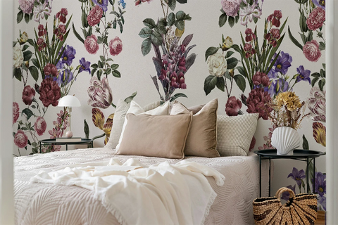 Floral wallpaper with roses, orchids, and varied botanicals in a pattern. 