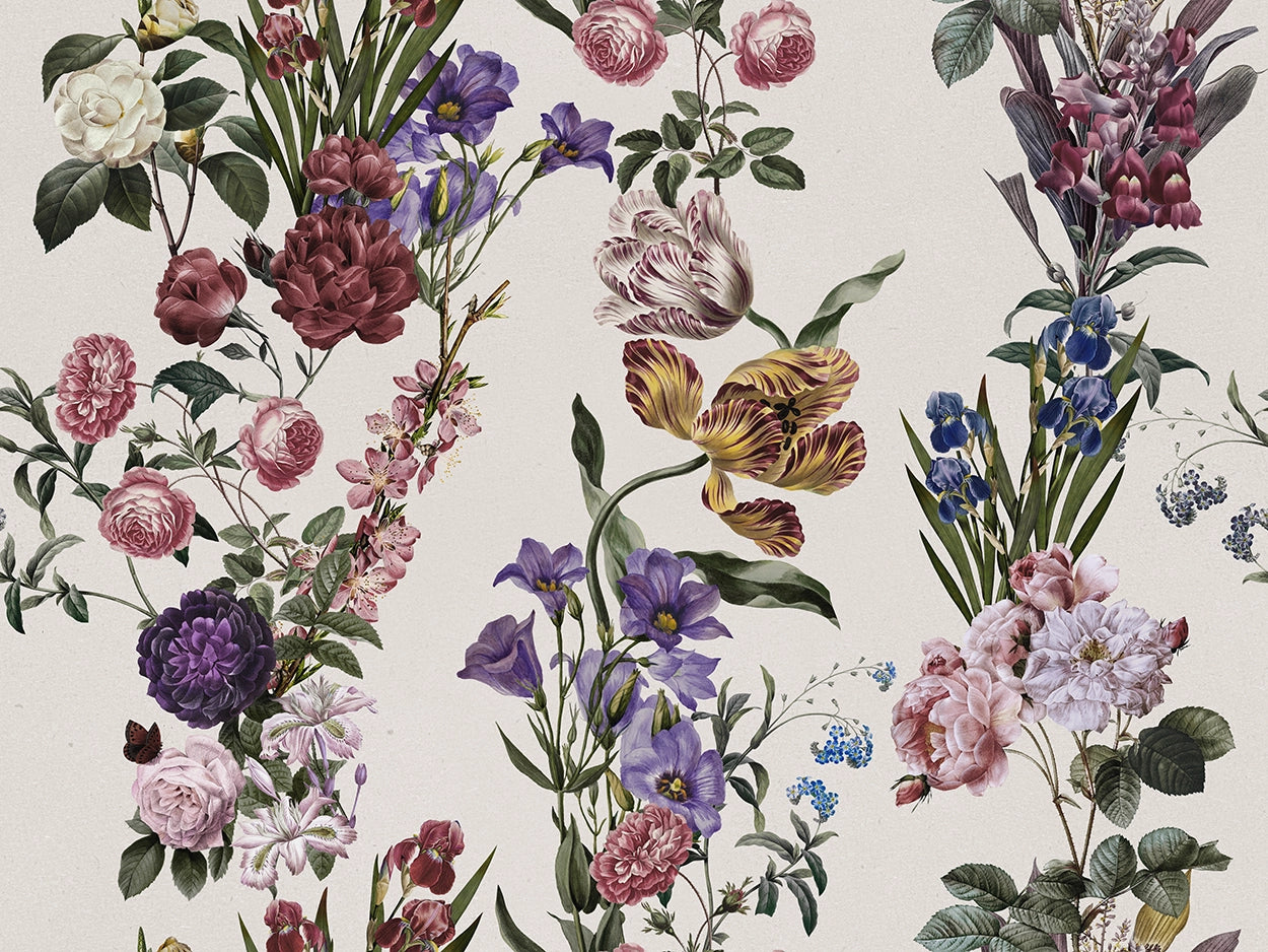 Botanical floral wallpaper pattern featuring vintage-style illustrations of roses, tulips, lilies, and other flowers in pink, purple, yellow, blue, and white on a warm off-white background.