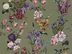 A botanical floral wallpaper pattern featuring pink, purple, white, and yellow flowers with green leaves on a muted olive green background.