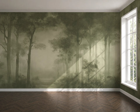 A large wallpaper mural depicting a misty olive-green forest with tall trees and soft light beams, installed on a room wall above a dark wood herringbone floor, with a white window on the right.