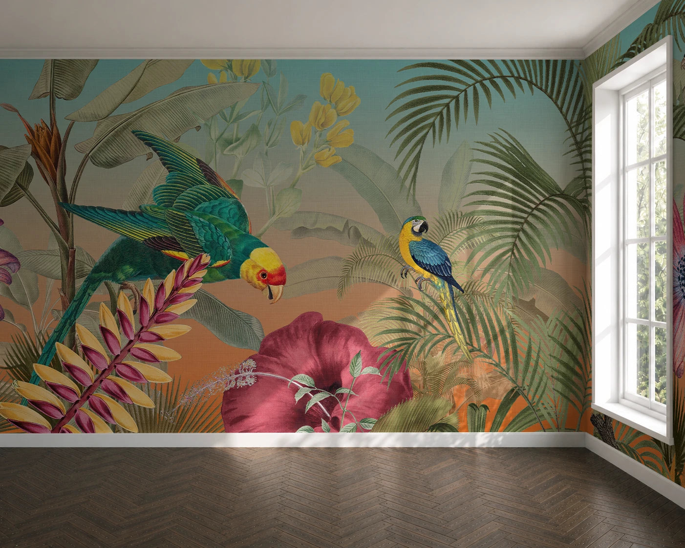 A tropical jungle wallpaper mural featuring colorful parrots, palm leaves, and large pink flowers, shown installed on a room's wall above a dark wood herringbone floor.