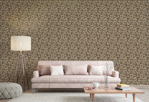 A modern living room with a beige sofa, a floor lamp, and a wall featuring a tapestry wallpaper in an oak leaf pattern. 