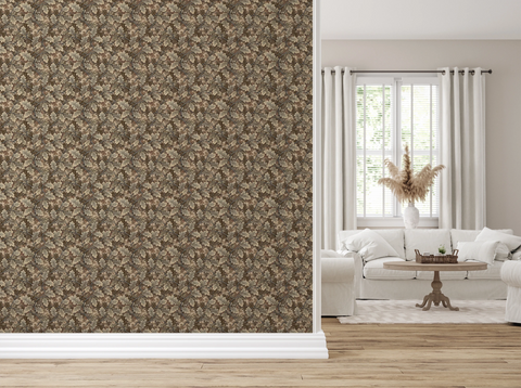 A modern living room, with white textile furniture, a large vase with a beige flower, and a wall featuring a tapestry wallpaper in an oak leaf pattern. 