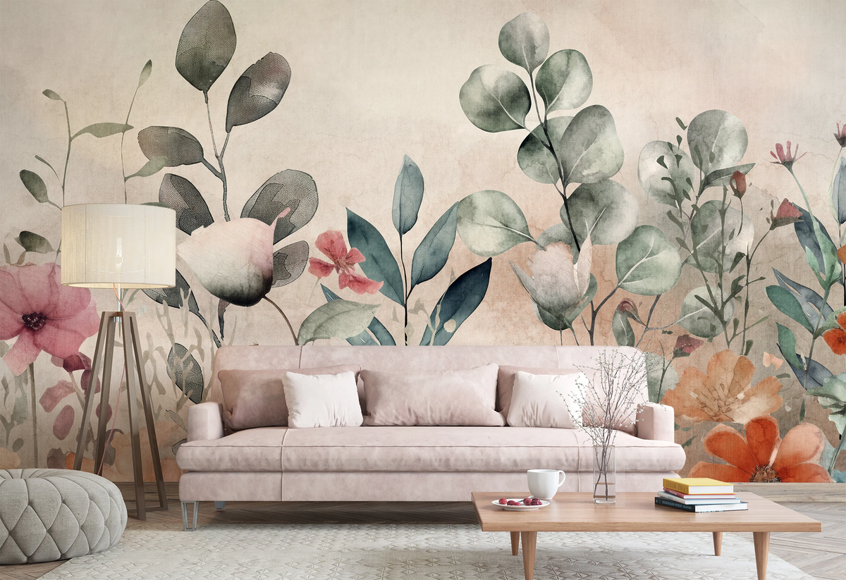 Oversized watercolor floral wallpaper in a pastel living room with a blush white sofa and wooden coffee table.