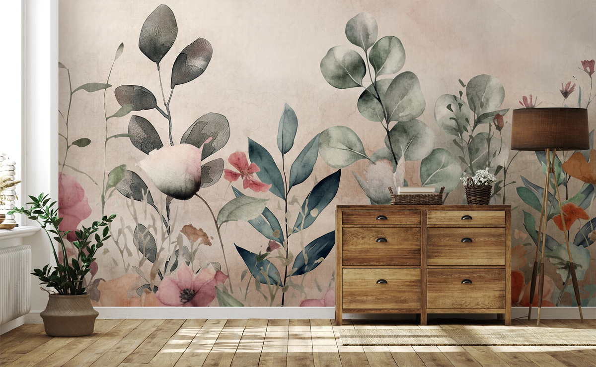 Botanical floral wallpaper with pastel flowers and green foliage behind a rustic wooden chest and woven baskets.